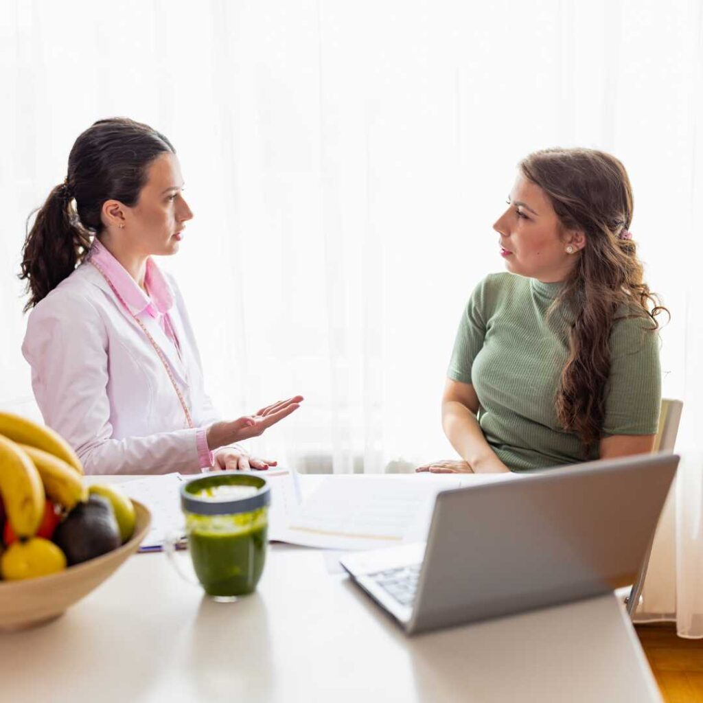 A dietitian consults with a client.